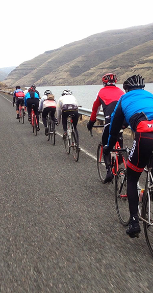 Bicyclists riding along Snake River