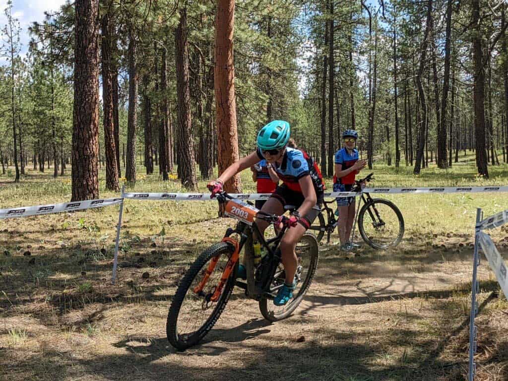 Cyclist coming around corner during race